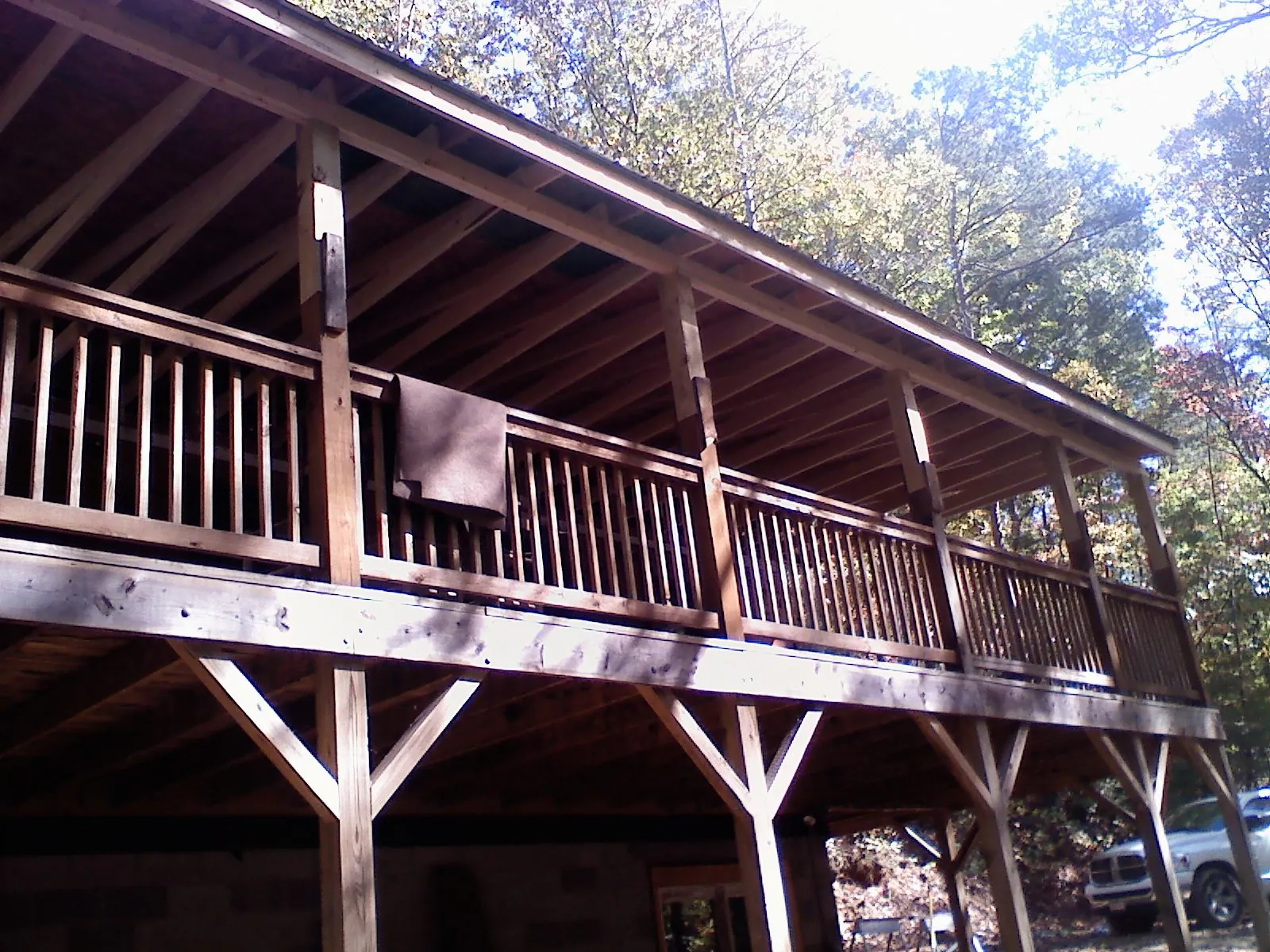 Timber framing under a new elevated porch and deck — Roof Leak Repair in Bejou by Roofing Brothers